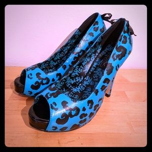 Iron Fist Cheetah Platform Heels sz 9